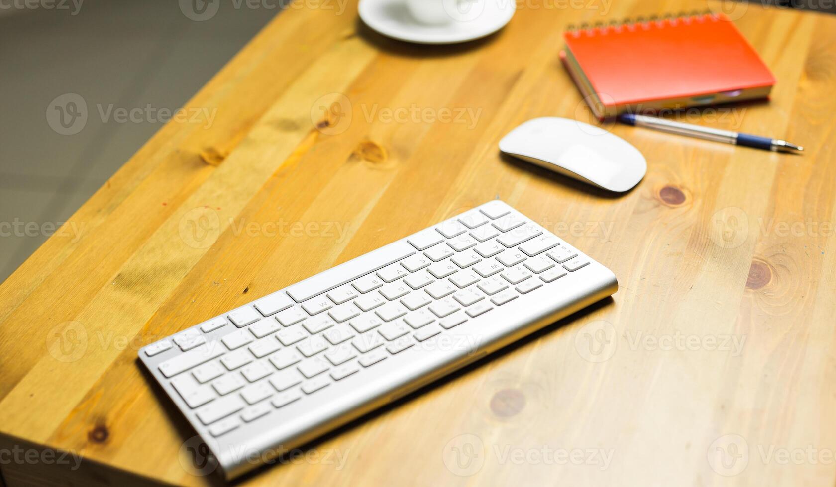 Desk accessories desktop, keyboard, computer mouse on wooden oak table photo