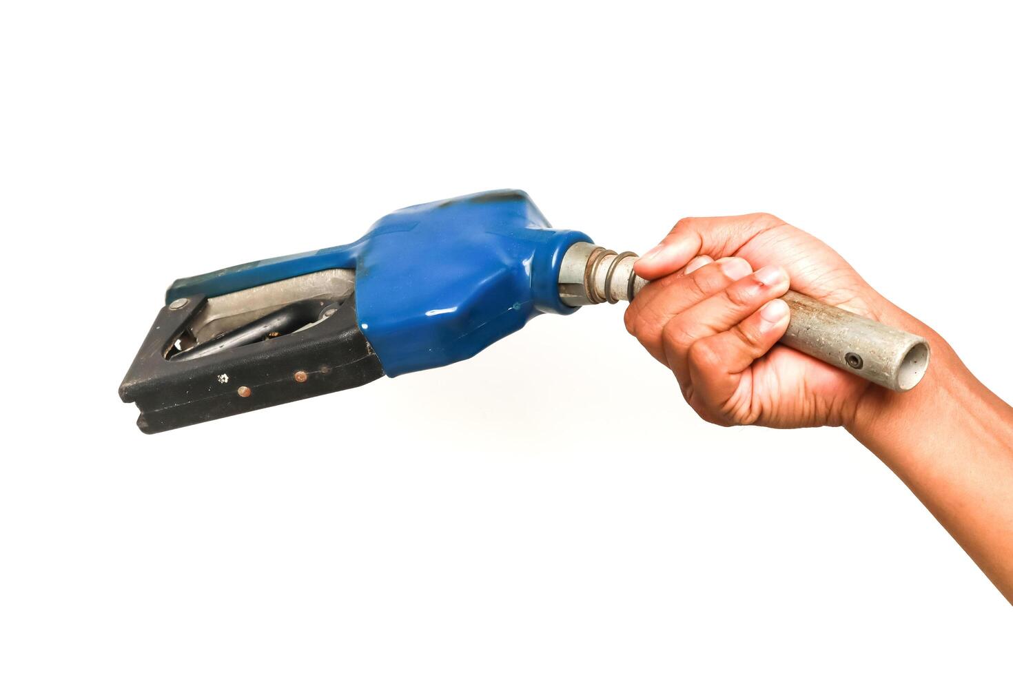 Hand holding a blue gasoline pump nozzle ready to fill the car's tank, isolated on a white background photo