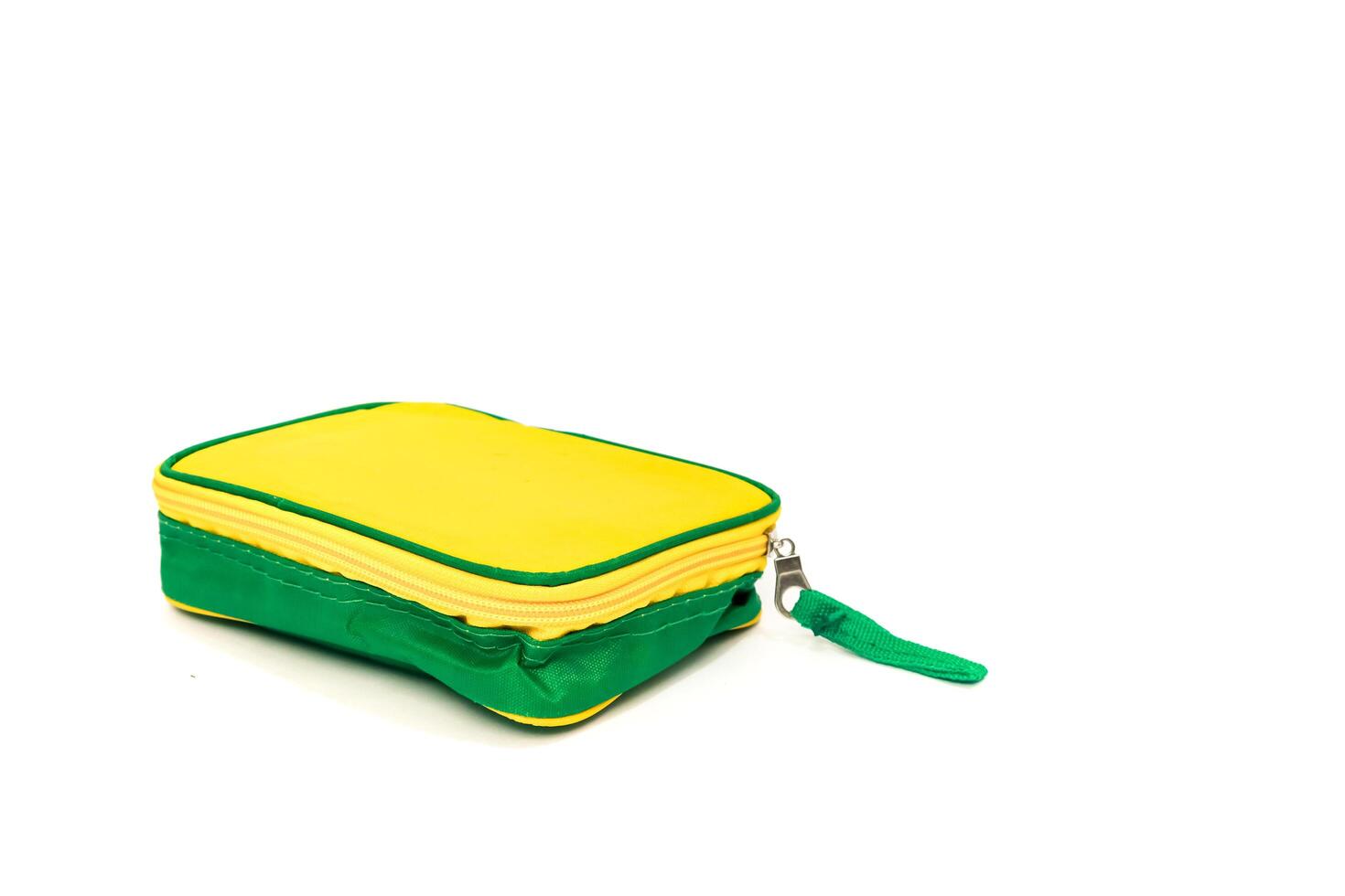 Close-up shot of a vibrant yellow and green zippered pouch isolated on white background photo
