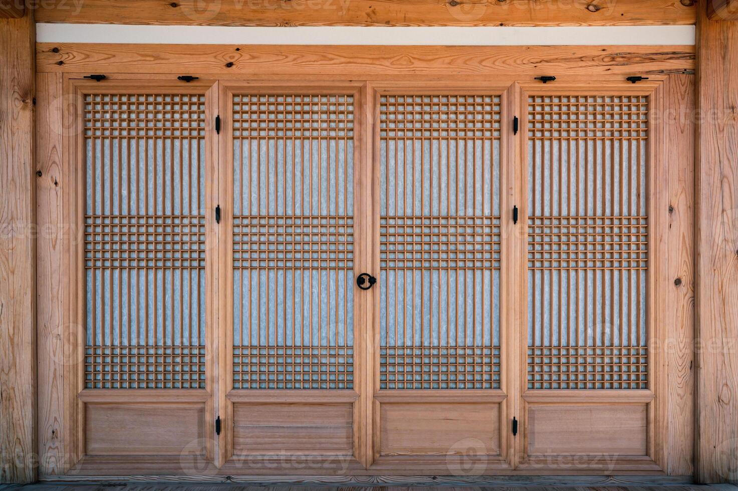 Traditional wooden closed door with paper decoration photo