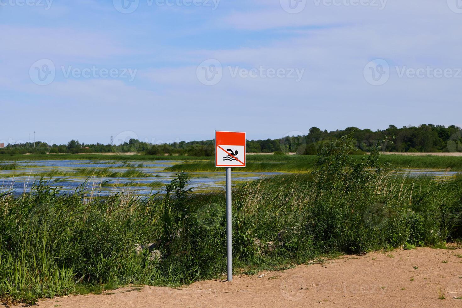 Warning Sign Near Wetlands Please help us preserve the vital natural habitats and ecosystems photo