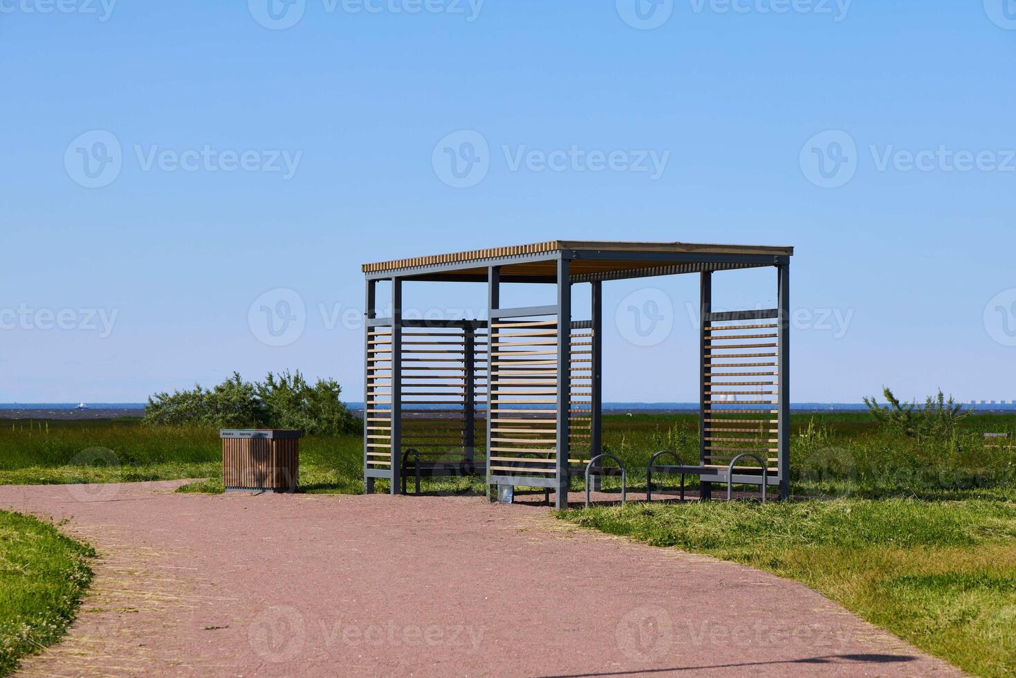 The Modern Pavilion located by the Sea, beautifully set against a Clear Blue Sky photo