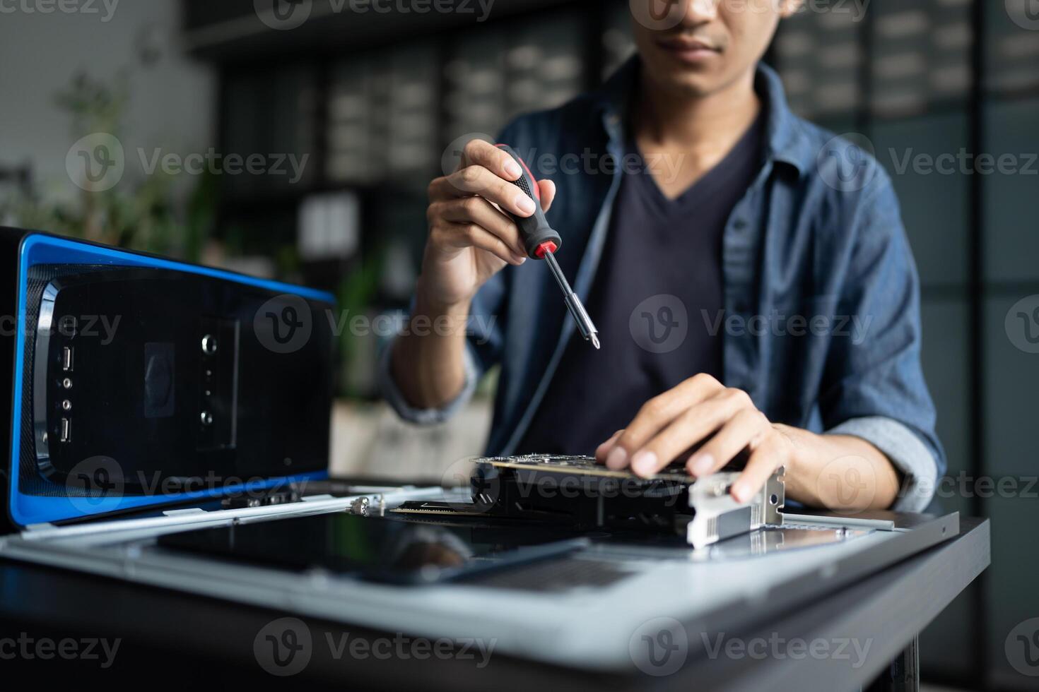 IT Engineer man working on a laptop computer photo