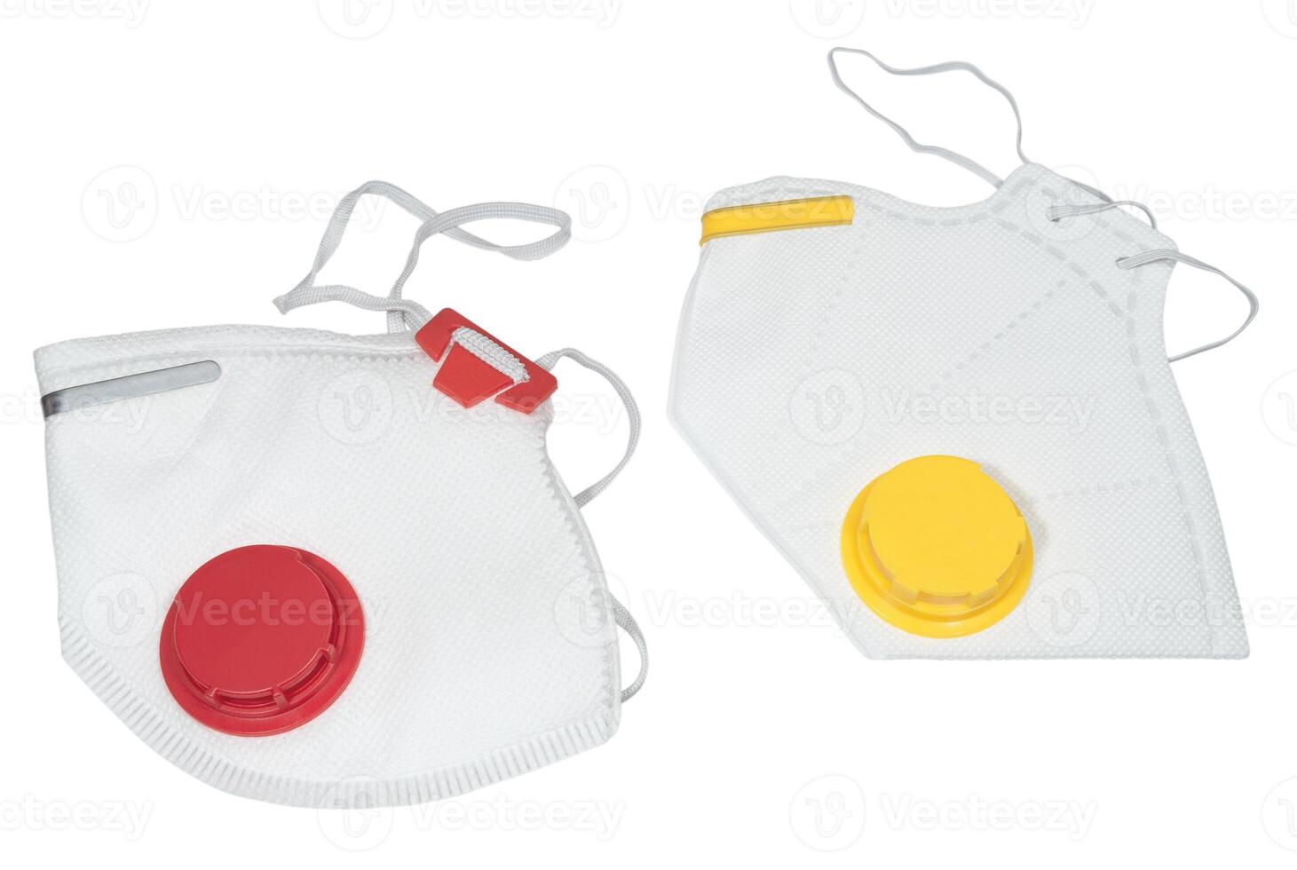 Respiratory face masks with valves of red and yellow color photo