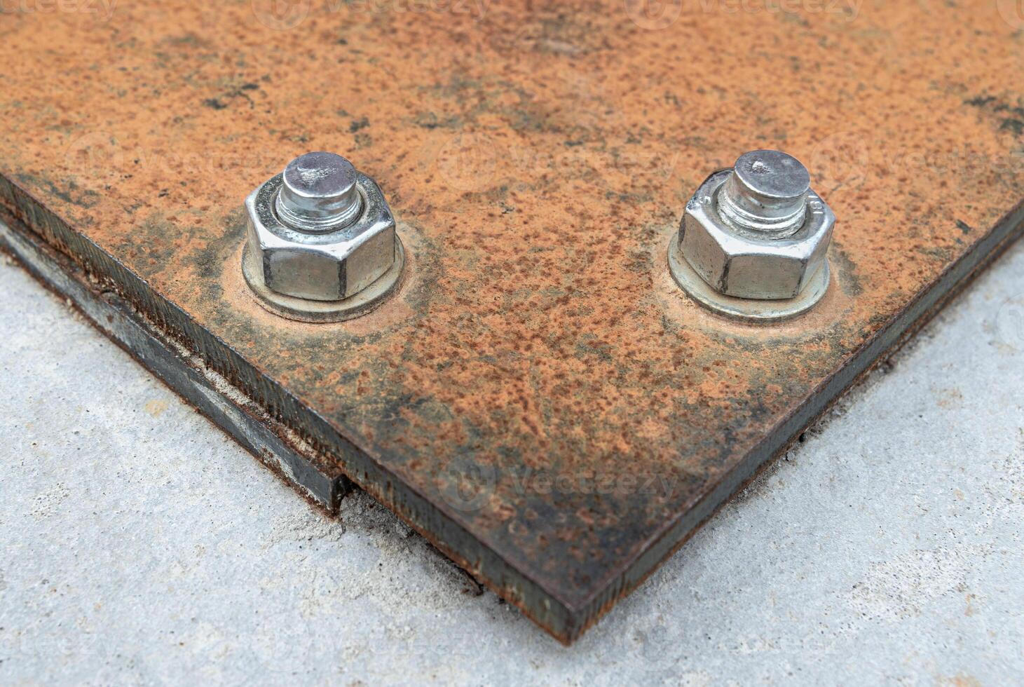 Bolted joint of metal plates photo