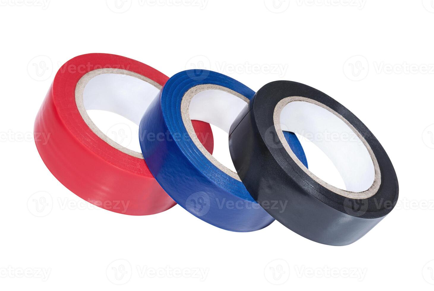 Three coils of multicolored adhesive tape photo