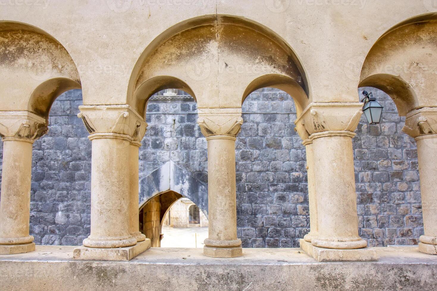 Old ancient stone-built historic city with architectural landmarks in Dubrovnik photo