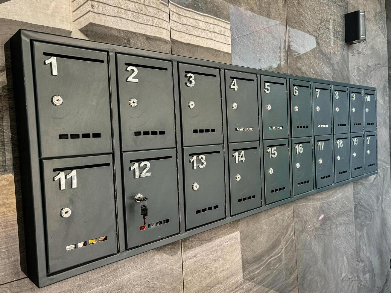 small mailboxes on the wall photo