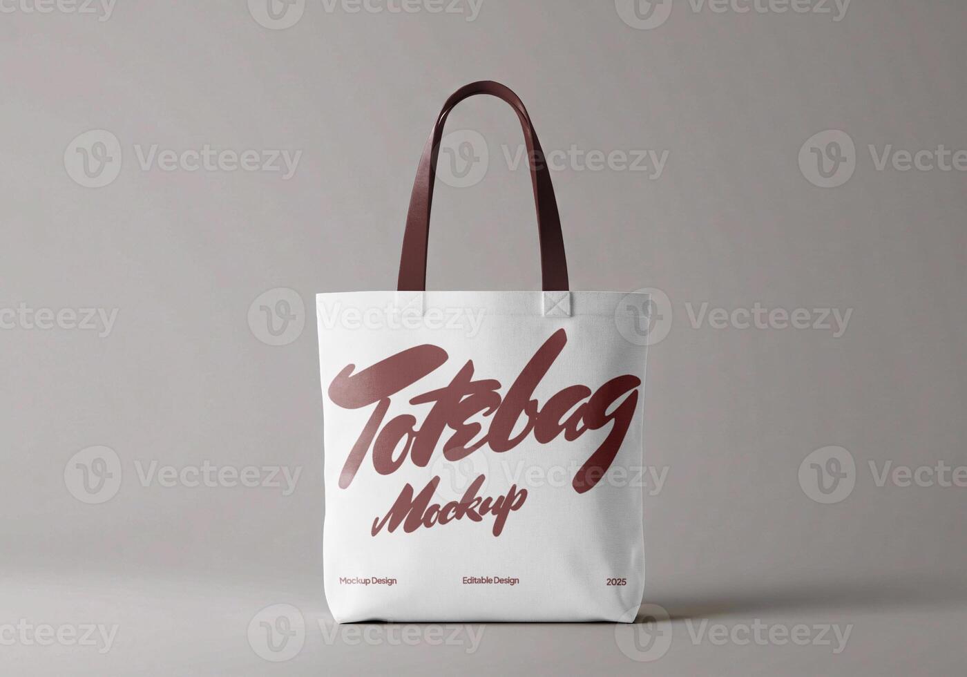 Tote bag mockup with red handles on light background front view photo