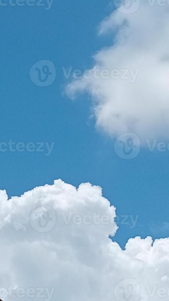 A large white cloud is in the sky photo