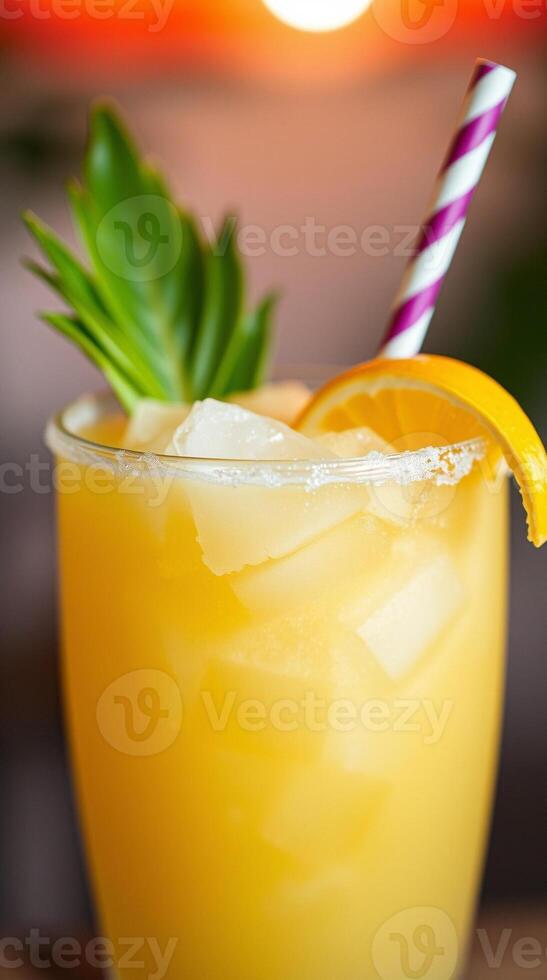 Refreshing citrus cocktail garnished with an orange slice and a sprig of greenery. photo