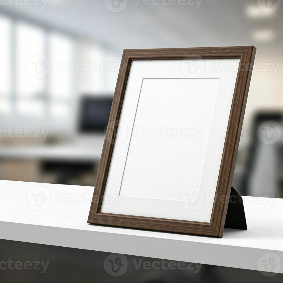 Mock blank picture frame on a plain white ledge in an office photo