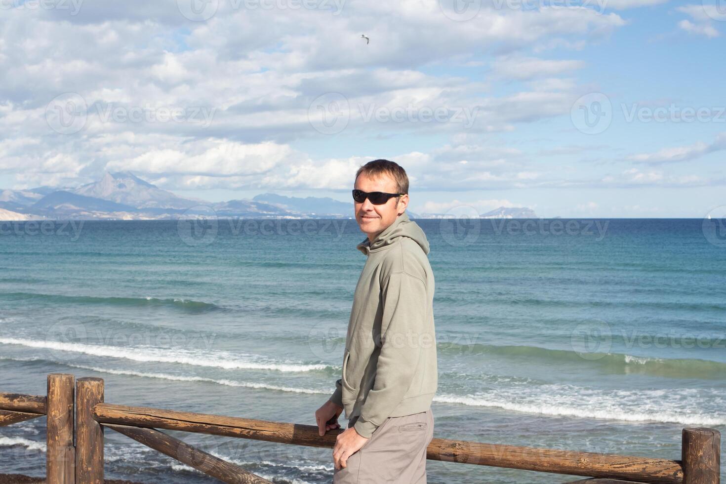 Exploring the serene coastal beauty of Spain during a relaxed getaway by the beach photo