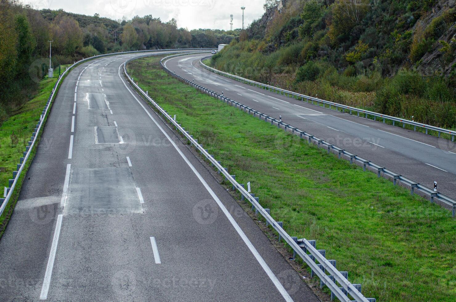 road trip background an empty highway under a cloudy sky photo