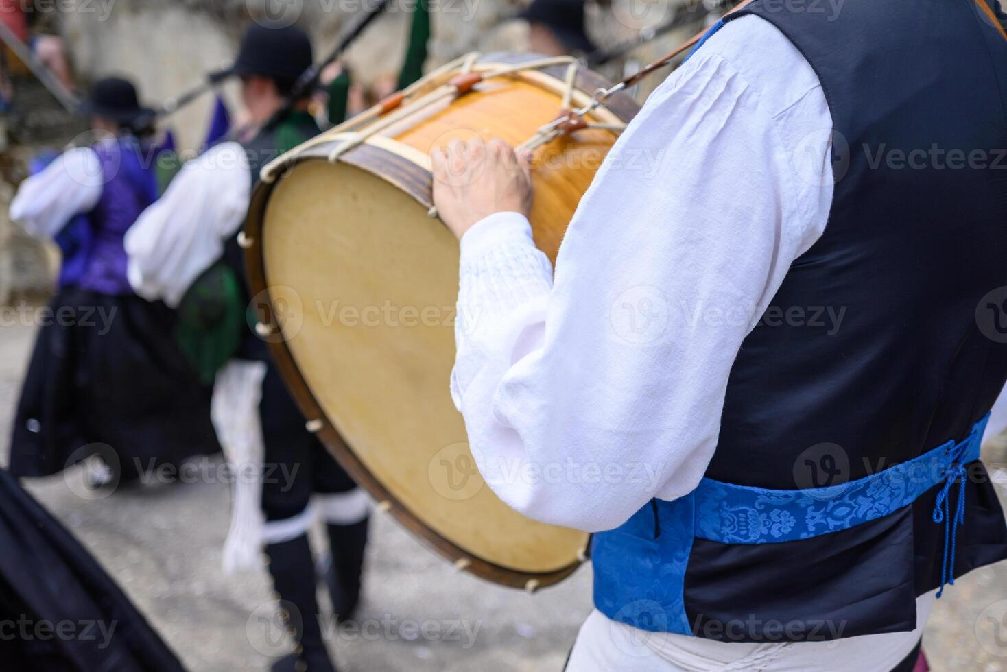 musicians playing traditional folk music during popular festival in Galicia. Spain photo
