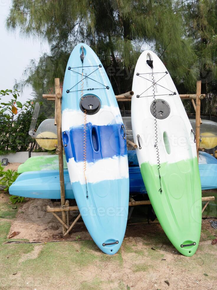 Kayaking adventure beach location outdoor activity sunny environment dynamic viewpoint photo