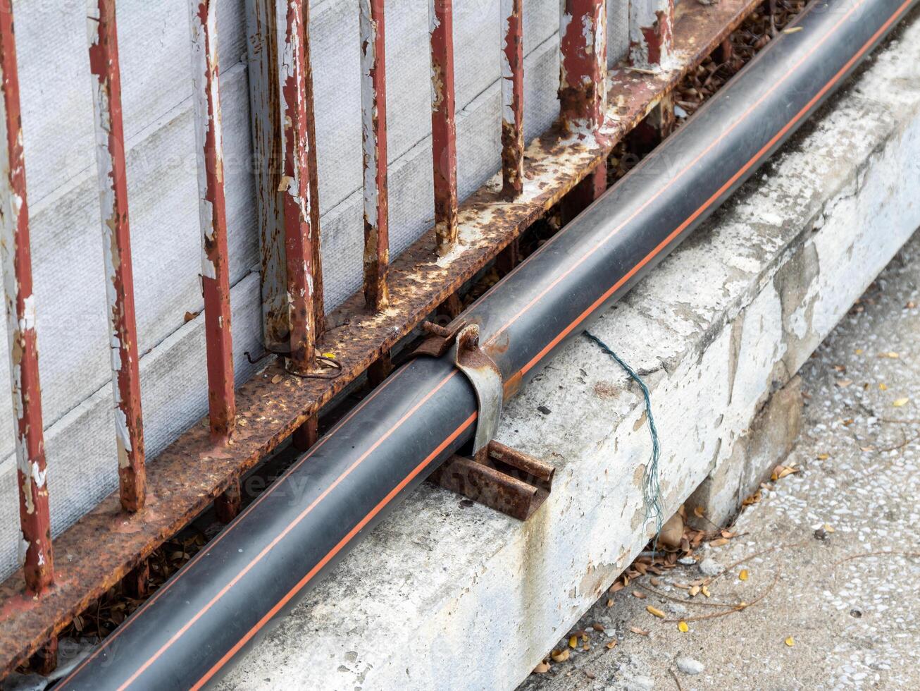 Rusty pipelines in urban settings ground-level infrastructure maintenance insights photo