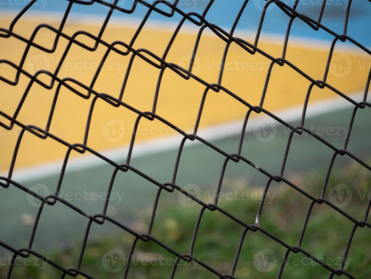 Sports action basketball court fence urban area photography outdoor setting close-up urban sports environment photo