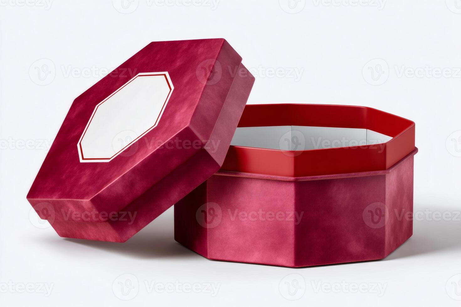 Open empty hexagonal cardboard gift box with blank label is waiting for a present photo