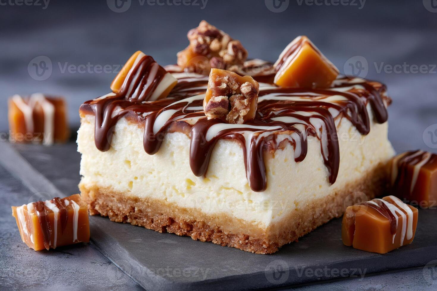 Delicious cheesecake with dripping chocolate, caramel candies and pecan nuts topping photo