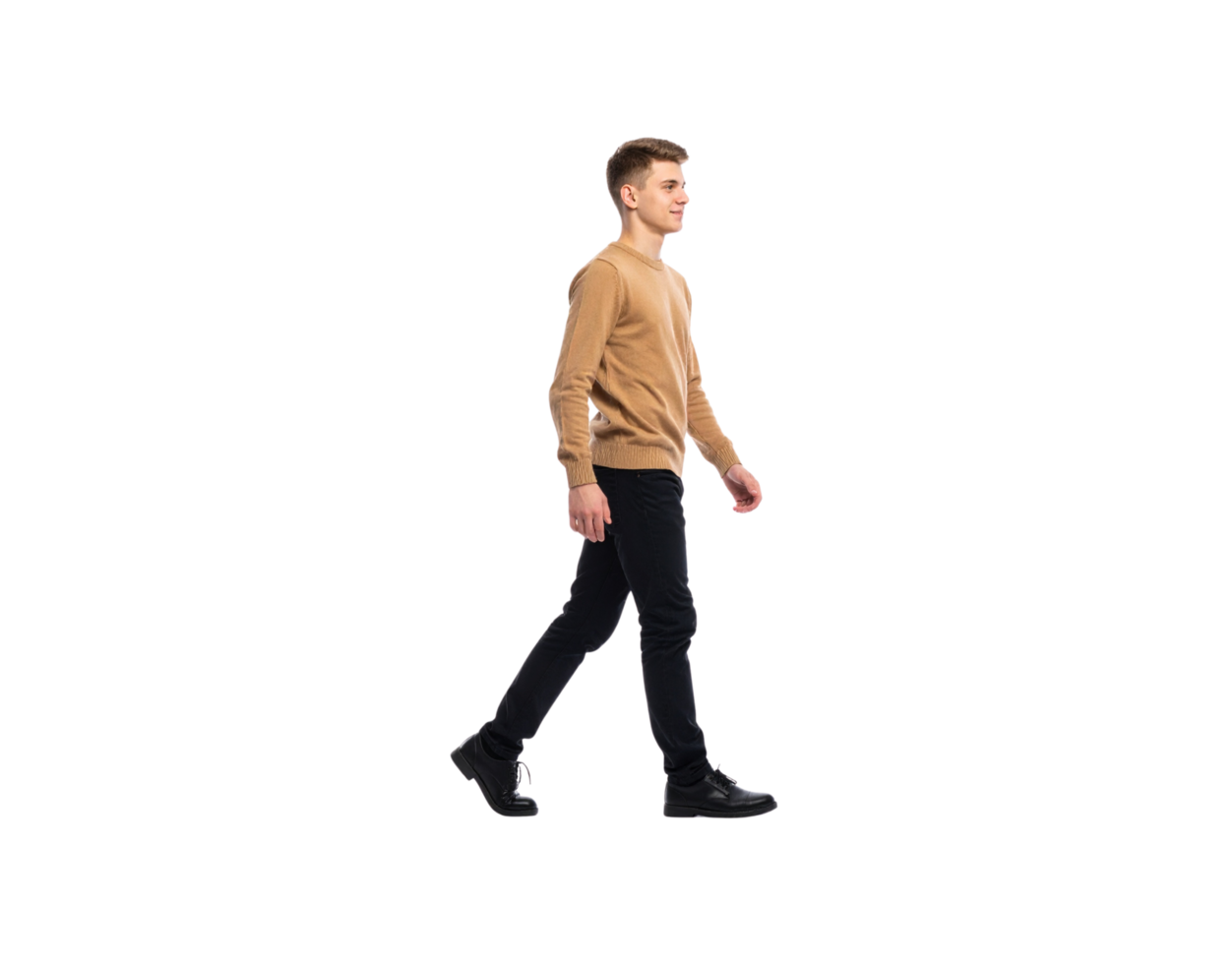 Young Man Walking in Casual Attire Tan Sweater and Black Jeans. png
