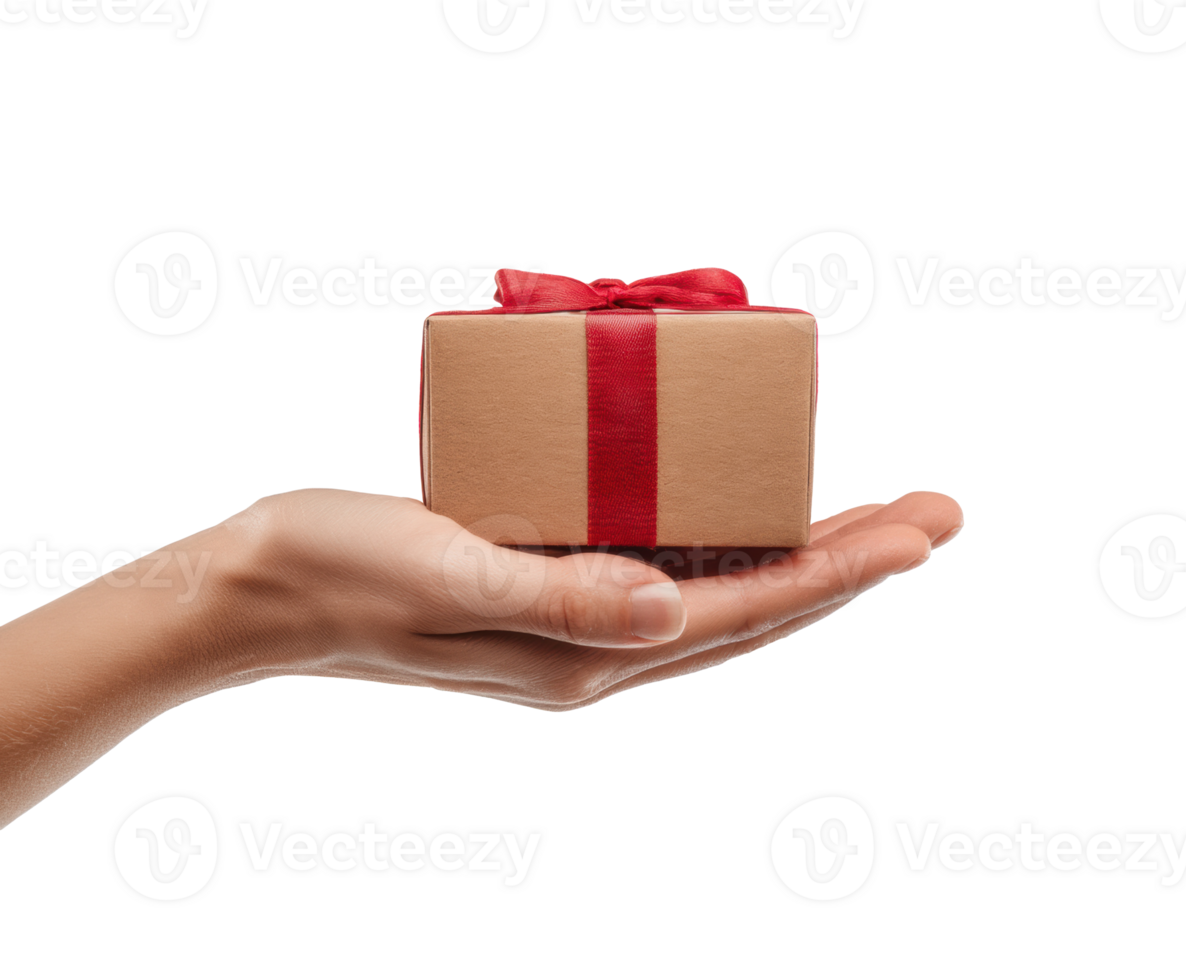 Hand holding a gift box with red ribbon for celebration event png