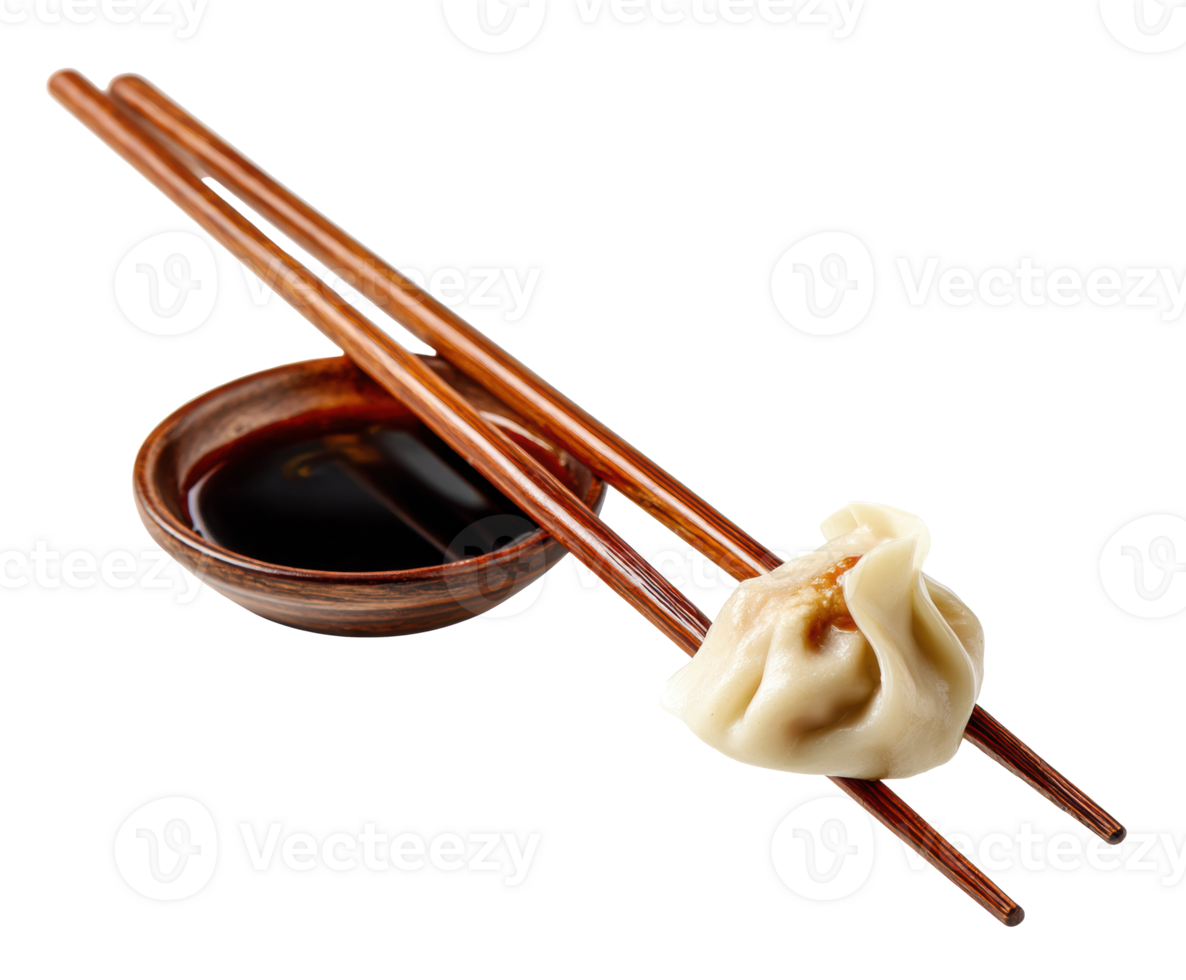 Delicious dumpling served with soy sauce on chopsticks for dining png