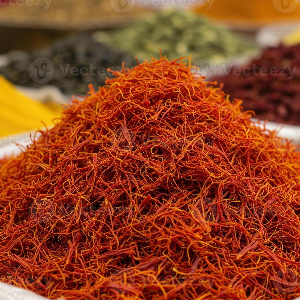 Aromatic saffron threads in a colorful composition photo