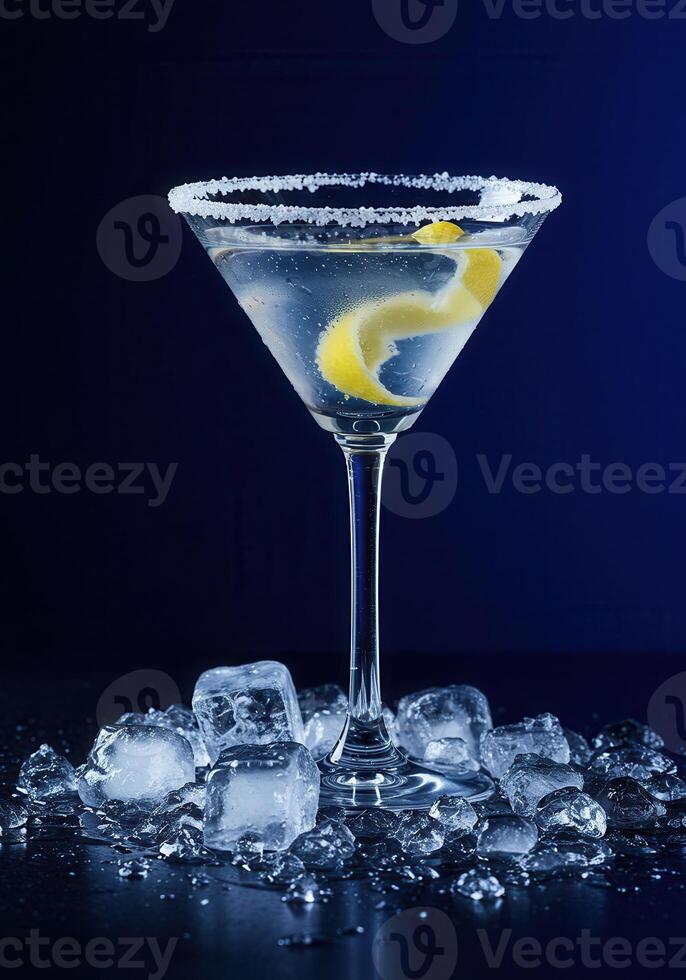 A sophisticated martini with a lemon twist, garnished with sugar and ice photo