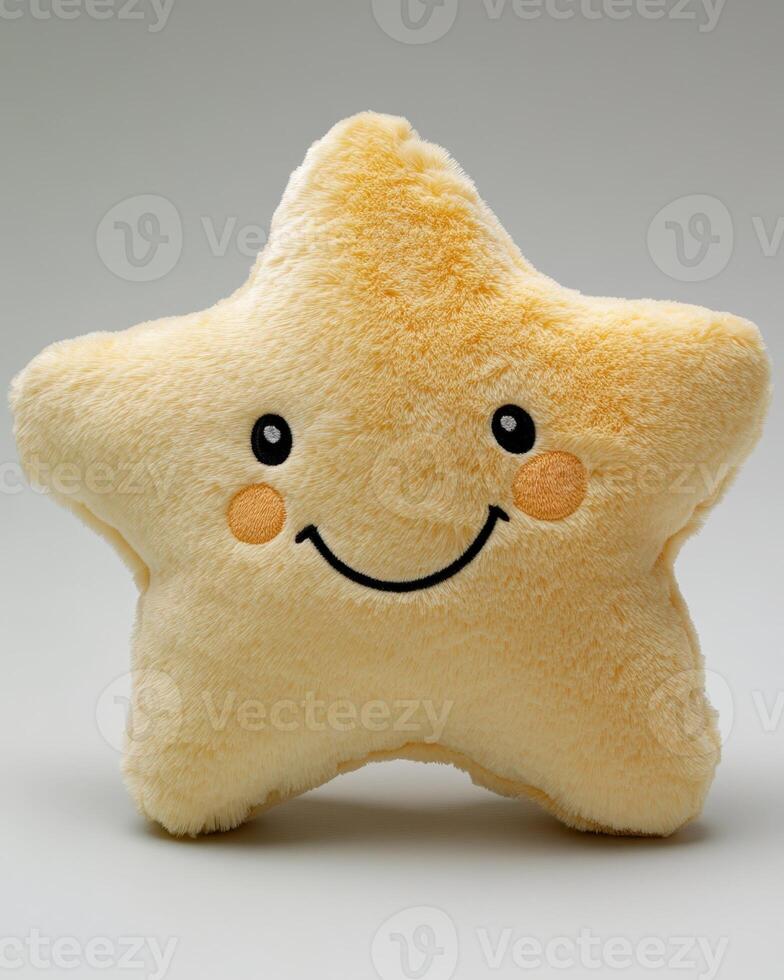 A star shaped stuffed animal with a smiley face photo