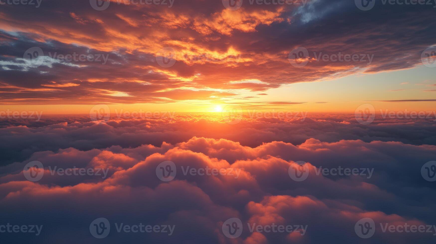 Sunset above clouds photo