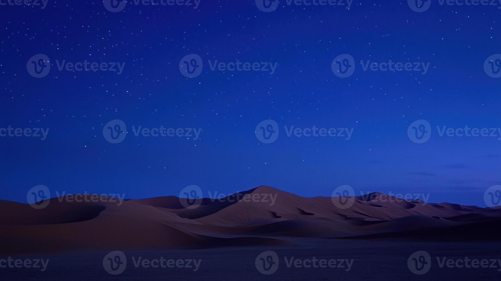 Desert at night under a starry sky photo