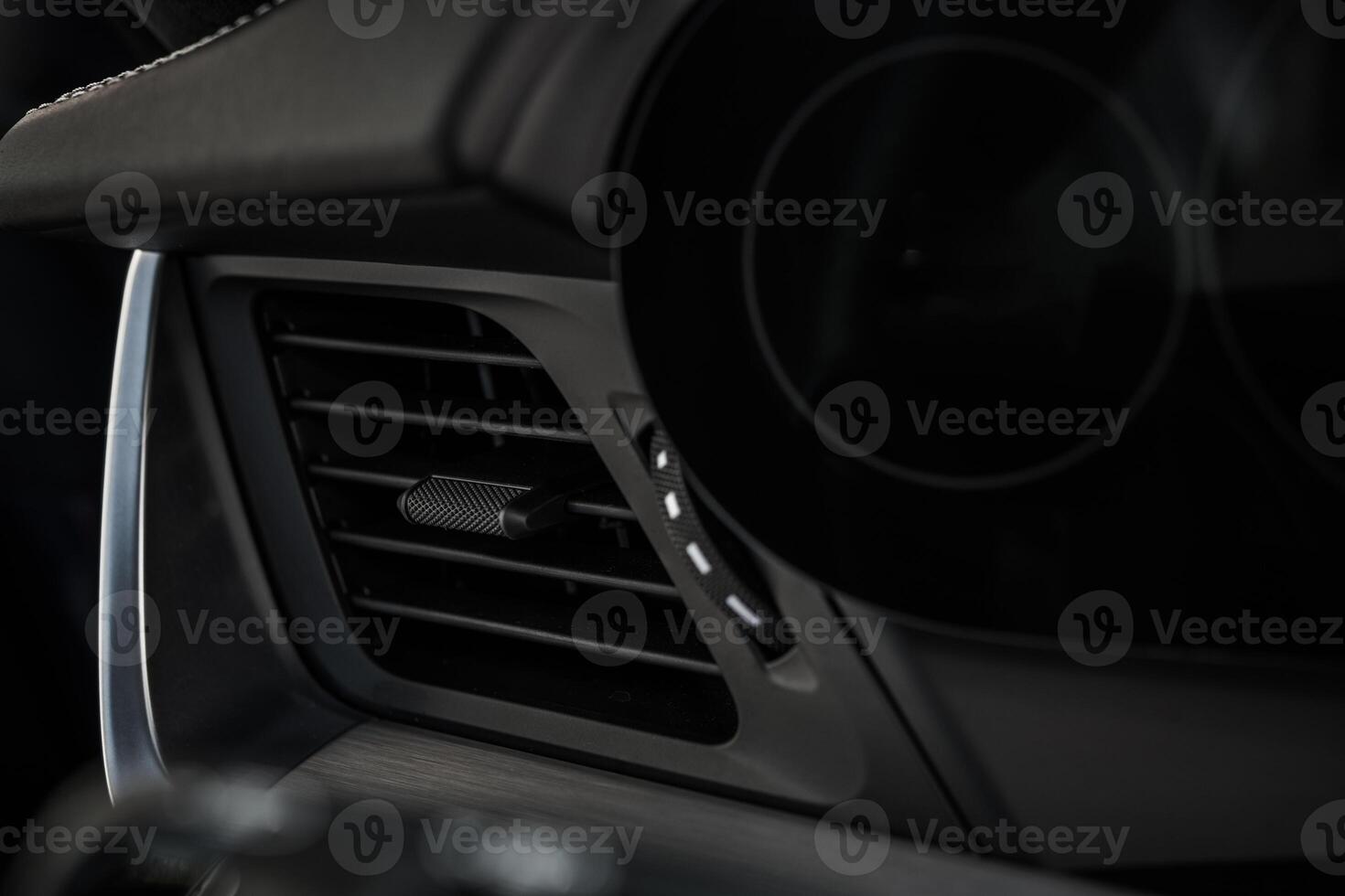 Interior View of a Modern Car Dashboard Highlighting Air Vent Design and Control photo
