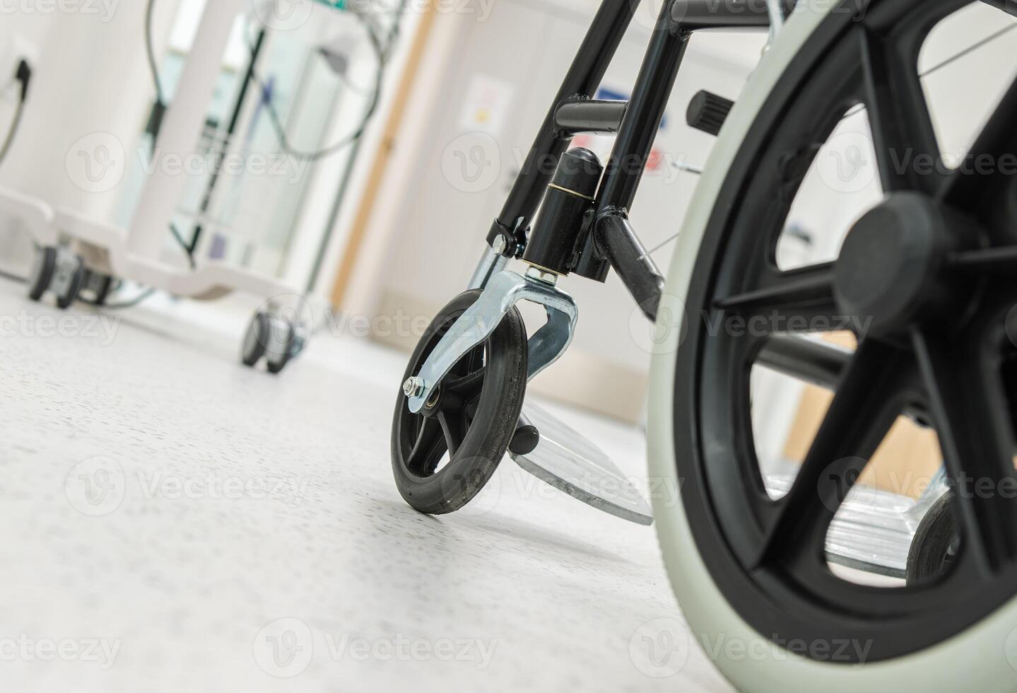 Wheelchair Positioned on Hospital Floor During Quiet Afternoon Hours photo
