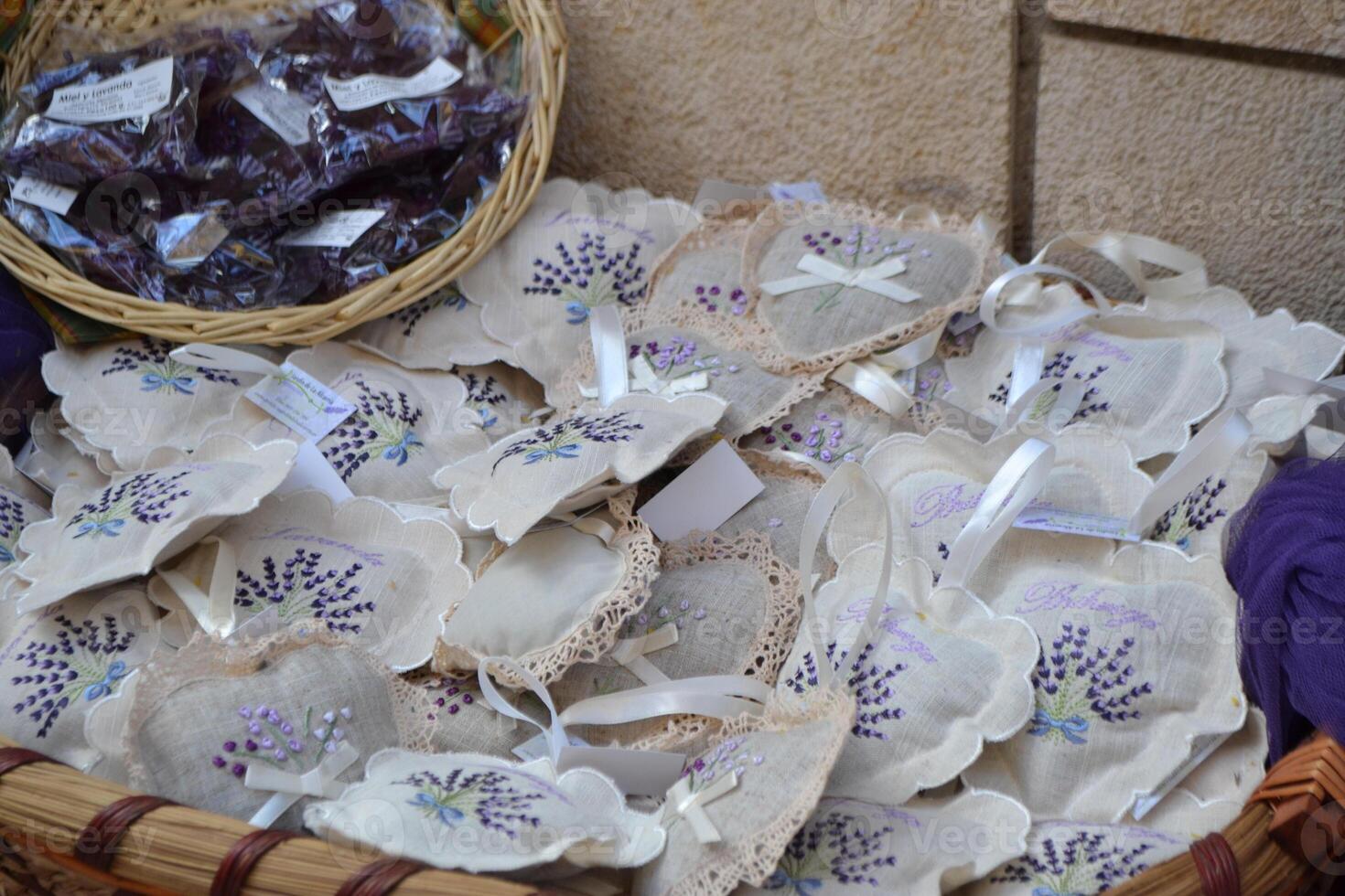 Aromatic lavender bags and crafts at Brihuega festival in Spain. Embroidered sachets with lavender photo