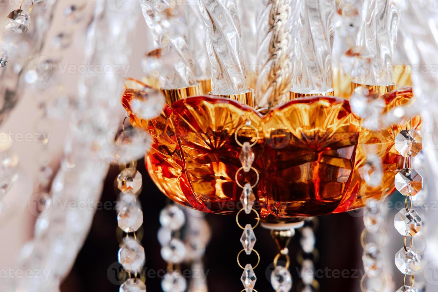 Elegant glass chandelier highlighting intricate design and craftsmanship in an indoor setting photo
