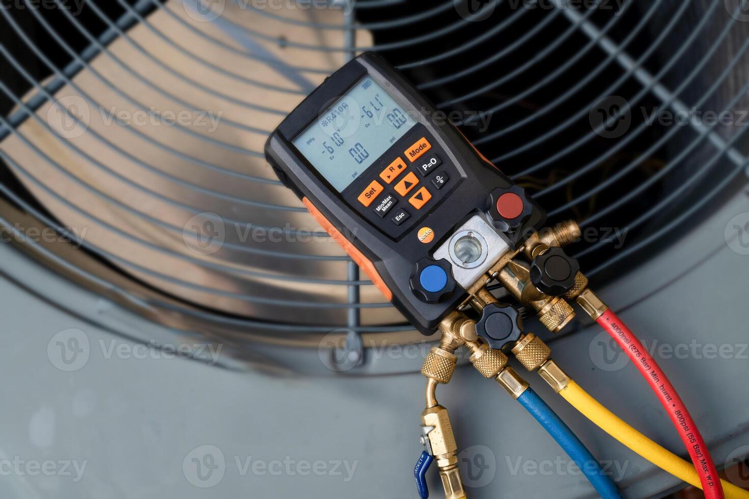 Digital HVAC Manifold Gauge on Air Conditioning Unit photo