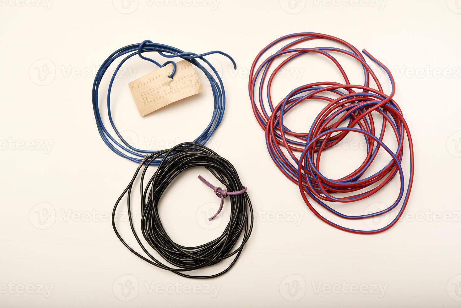Bundles of copper connecting wires in rubber insulation. Multicolored wires. photo