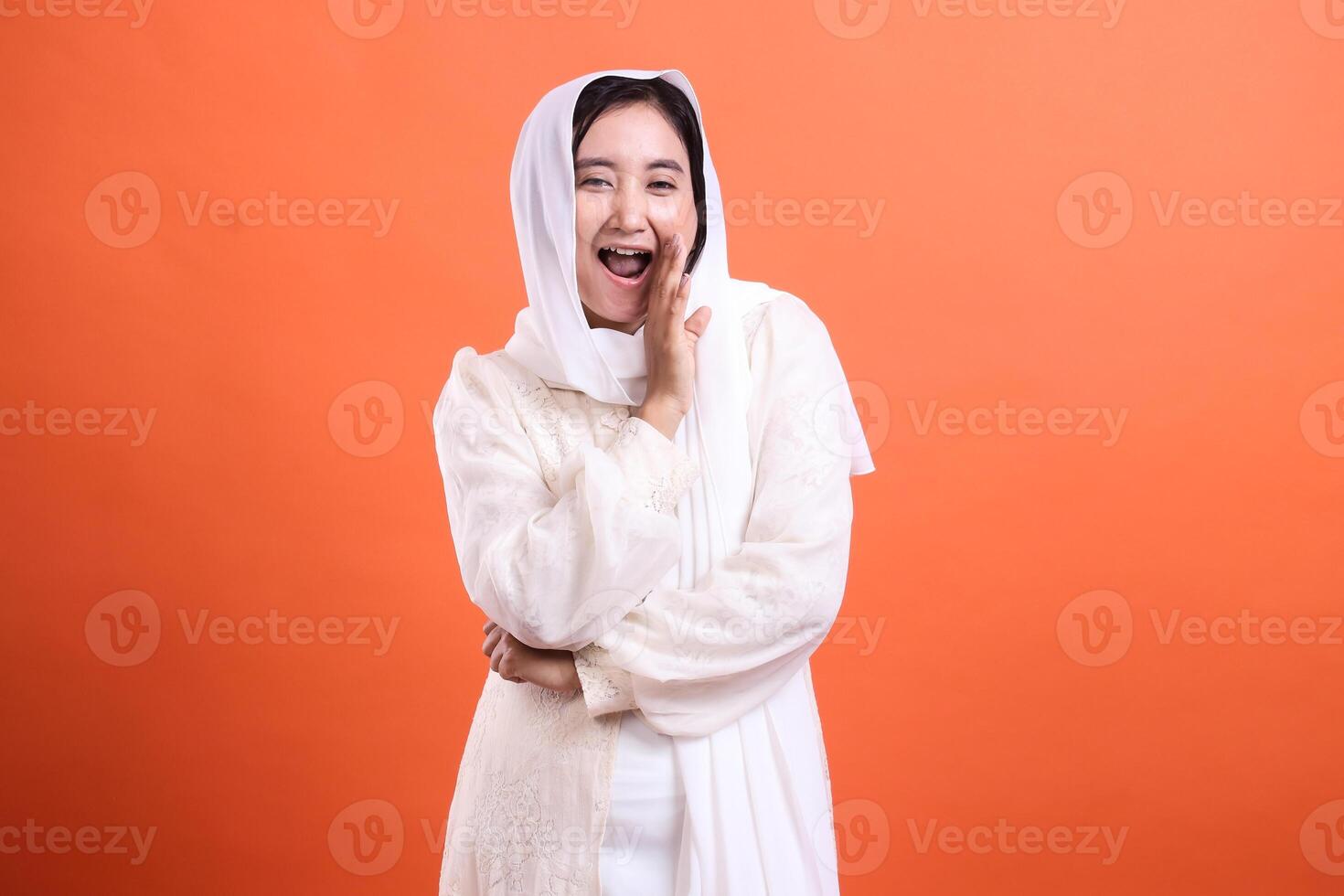 Joyful muslima expressing delight, conveying optimism and pleasa photo