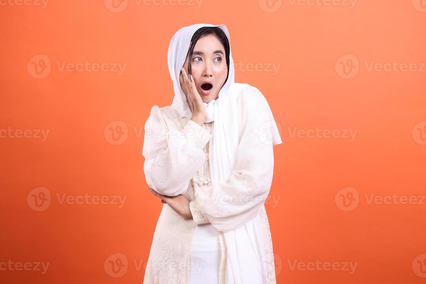 Startled Muslimah, Expression of Surprise and Awe, a young woman photo