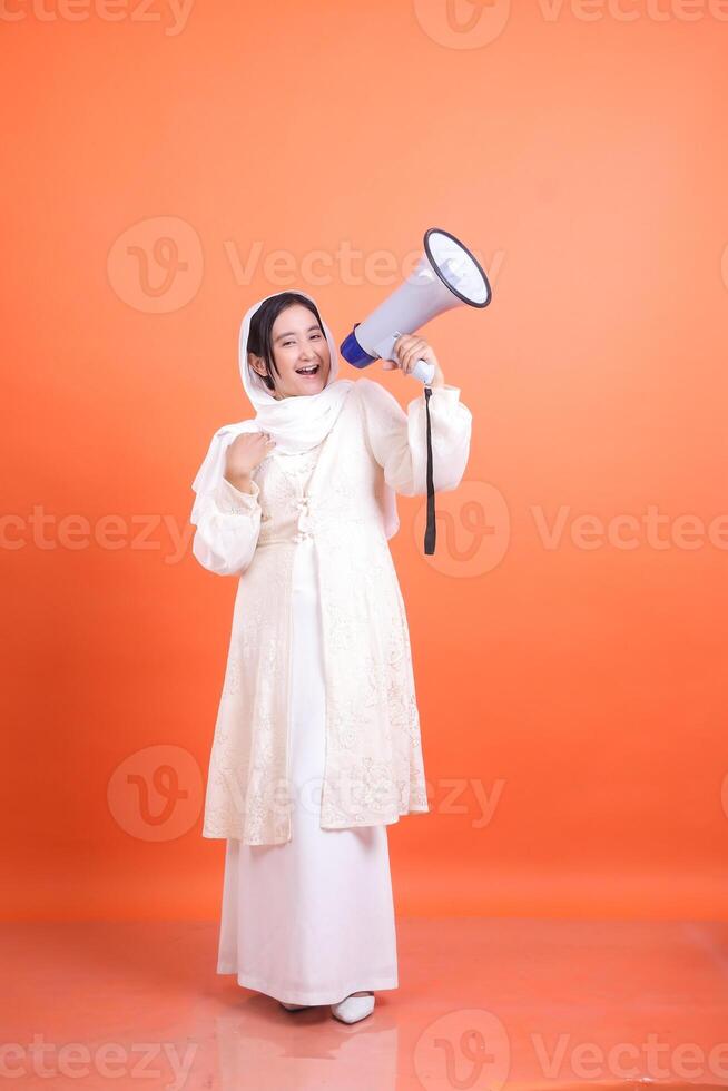 Enthusiastic announcement, a joyous young woman making an empowe photo