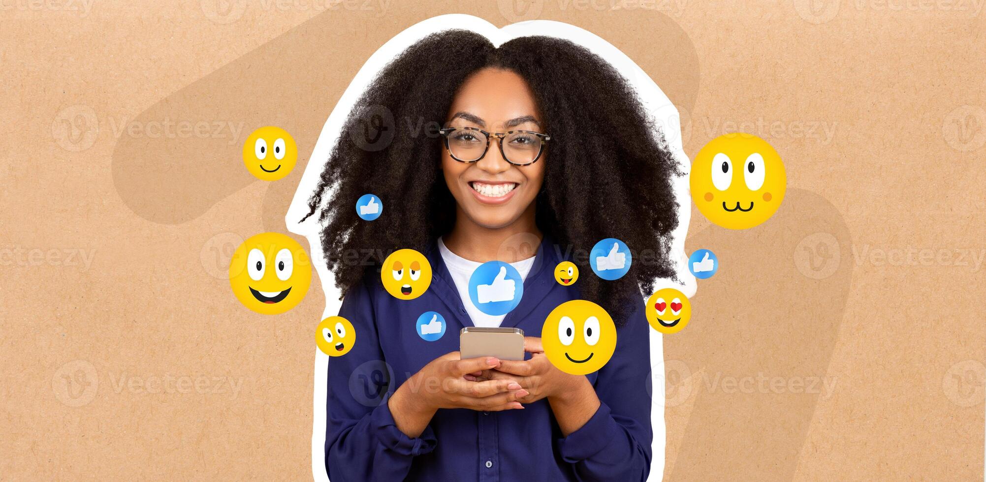 A cheerful woman with curly hair smiles while messaging on her smartphone. She appears engaged in a lively conversation, surrounded by various social media icons, indicating a fun interaction. photo