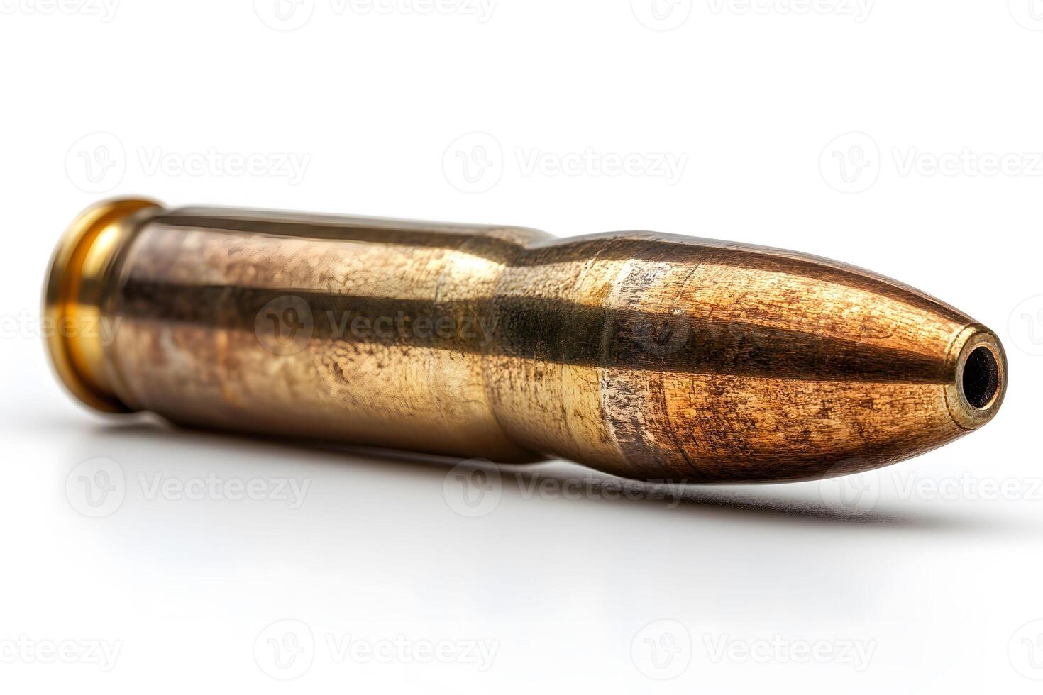 Metallic Bullet Close-Up on White Background for Design and Illustration photo
