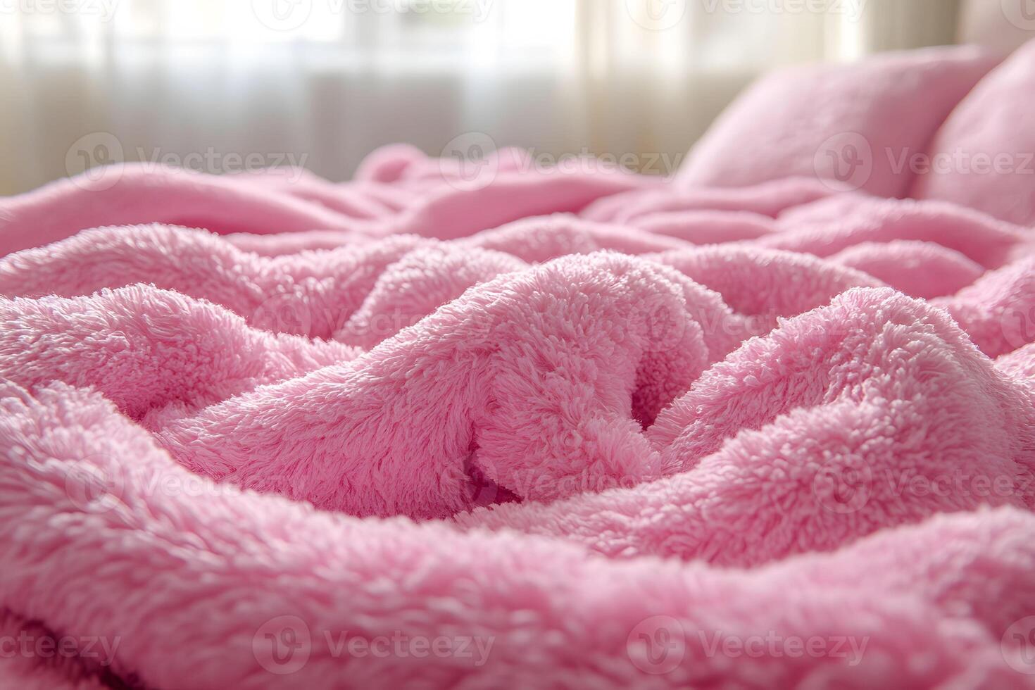 Cozy Pink Fleece Blanket on Bed for Warmth and Comfort in Bedroom Decor photo
