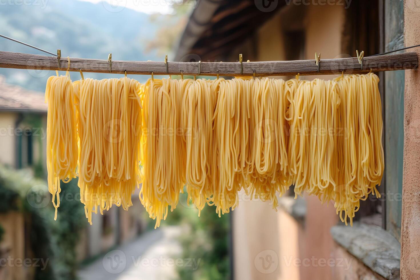 Traditional Italian Fresh Pasta Drying Outdoors in Rustic Village Setting photo