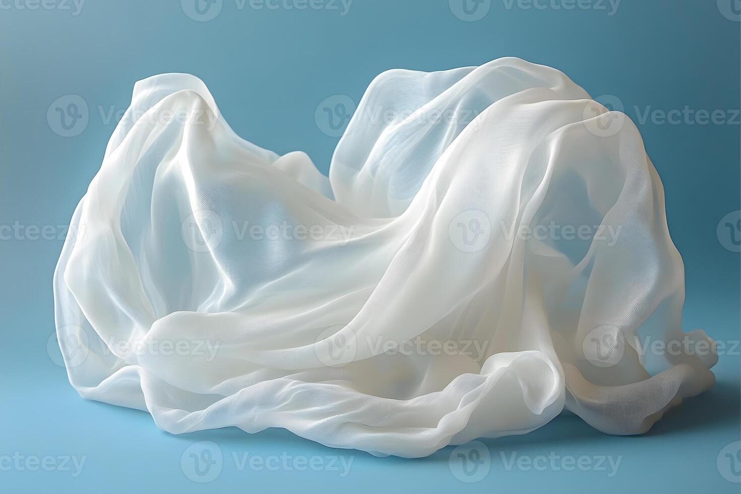 Ethereal Flowing White Fabric on Blue Background for Elegant Design Concepts photo