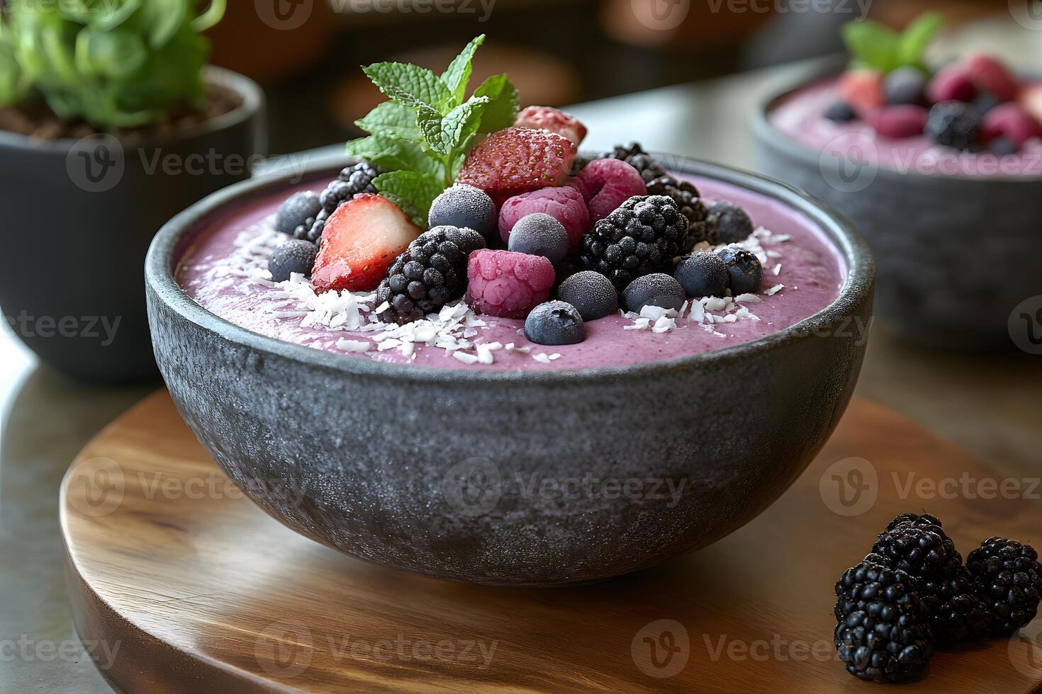 Delicious Mixed Berry Smoothie Bowl with Fresh Fruit and Coconut Garnish photo