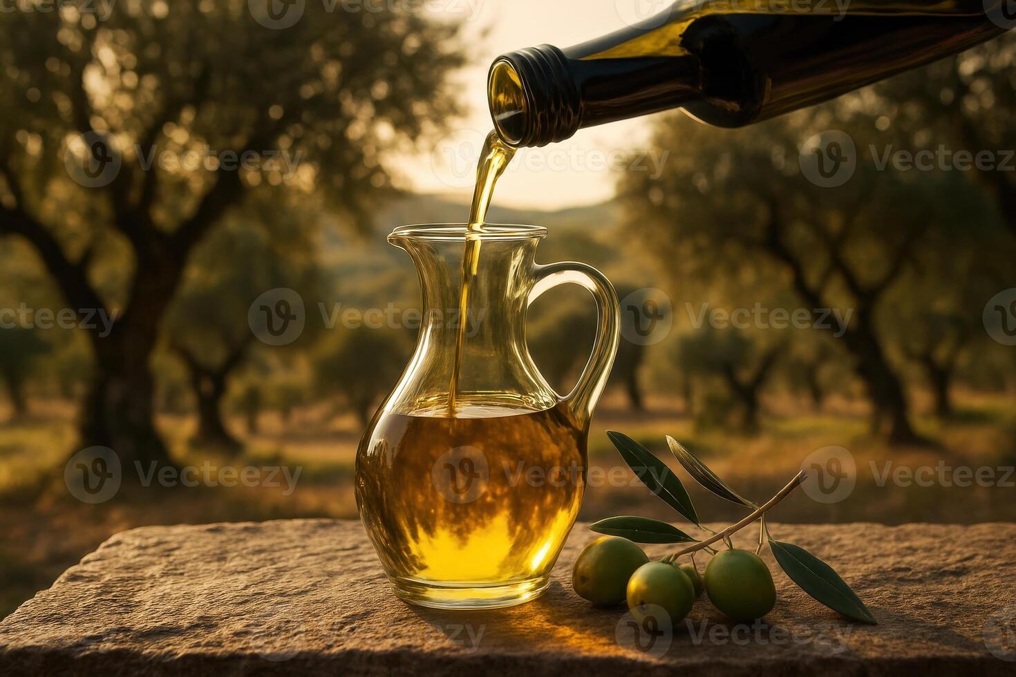 Golden olive oil pouring into glass carafe in a mediterranean olive grove photo