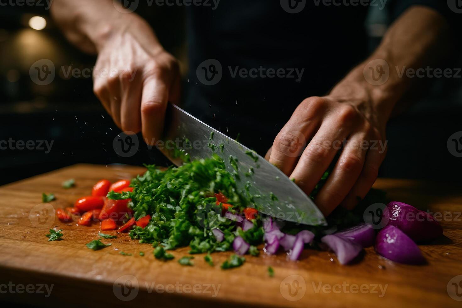 Dynamic close up of hands rapidly chopping fresh herbs and colorful vegetables photo