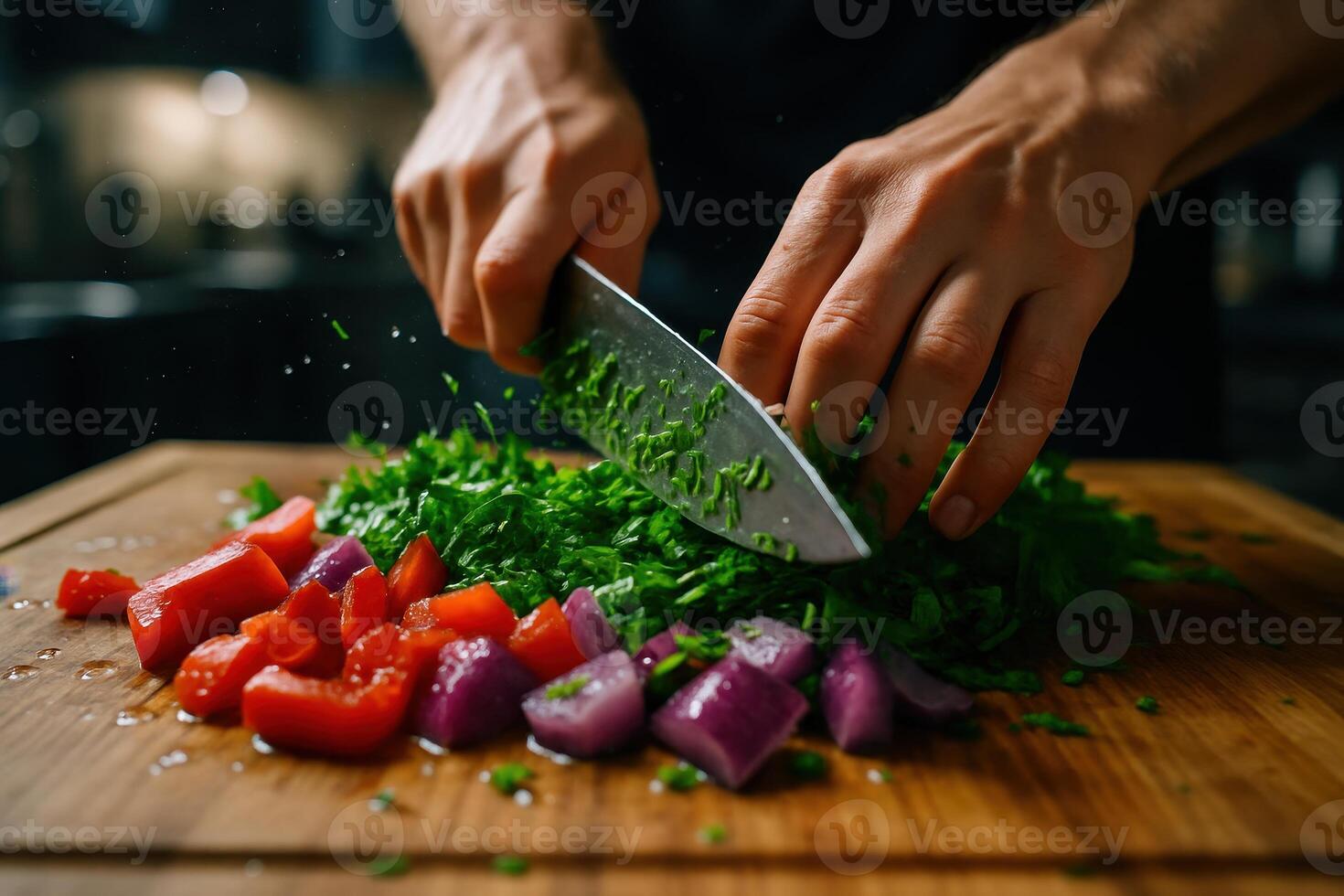 Close up of hands chopping fresh green herbs and colorful vegetables on a wooden cutting board photo